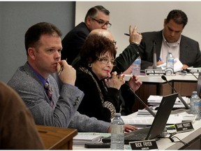 Amherstburg councillors Rick Fryer, left, Diane Pouget, deputy mayor Bart DiPasquale, behind, finance director Justin Rousseau and CAO John Miceli, right, during council meeting March 31, 2015.