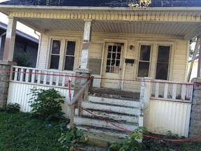 An abandoned home at 512 Elm St. is shown following an overnight fire, which resulted in $70,000 in damage, on Saturday, Oct. 11, 2015.