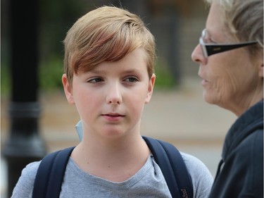 Brooklyn Nugent, 10, a grade 6 student at General Brock Public School and her grandmother Kelly Aquene are shown Tuesday, Oct. 6, 2015, in front of the school. They were commenting on the cockroach situation that closed the cafeteria recently. (DAN JANISSE/The Windsor Star) (For story by Carolyn Thompson)