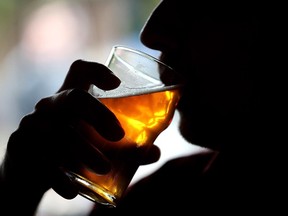 A Russian River Brewing Company customer takes a sip of the newly released Pliny the Younger triple IPA beer on February 7, 2014 in Santa Rosa, California.