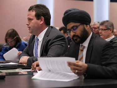 Kevin Campagna and Suk Bedi (right) deliver a report to council during a regular meeting at city hall in Windsor on Thursday, October 29, 2015.