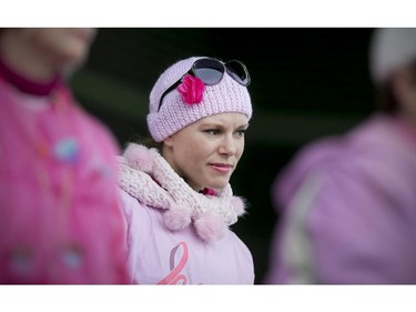 Cancer survivor, MichelleVoth, who has been cancer-free since 2011, joins other cancer survivors on stage at the Canadian Breast Cancer Foundation CIBC Run for the Cure at the Riverfront Festival Plaza, Sunday, Oct. 4, 2015.  (DAX MELMER/The Windsor Star)