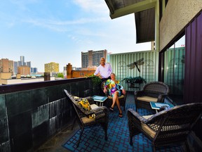 Wendy Smith, shown with her design consultant Tim Finlay of Coulter’s, “came home” to The Royal Windsor Terrace and a dynamic view of the Detroit River and skyline. - Ed Goodfellow: Special to Windsor Star