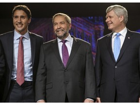 From left,  Liberal leader Justin Trudeau, New Democratic leader Thomas Mulcair and Prime Minister Stephen Harper, all meet and greet before the Globe and Mail Leaders Debate 2015 in Calgary, on September 17, 2015