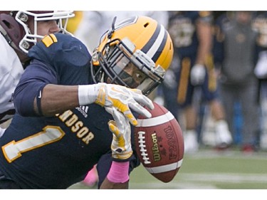 Windsor's Dave McDuffie watches as he is unable to hold onto the ball for a reception as the Windsor Lancers host the McMaster Marauders during OUA football action at Alumni Field, Saturday, Oct. 3, 2015.  (DAX MELMER/The Windsor Star)