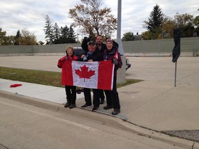 Four Canadians cheering on runners participating in the Detroit Free Press International Half Marathon, Sunday, Oct. 18, 2015. Submitted by Danette Watt from Alton, Illinois, U.S.