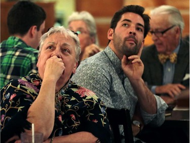Conservative supporters of Jo-Anne Gignac watch results come in on television on Oct.19, 2015 in Windsor, Ont.