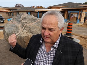 Erie Shores Hospice Co-Chair Cole Cacciavillani talks about the 1.5 billion year-old granite bolder that has been placed out front of the nearly completed Erie Shores Hospice in Leamington. The ‘Child of the Mountain’ has found its new home at the entrance of the new 10 bed Erie Shore Hospice in Leamington. The big rock will be a symbol of recognition of the overwhelming support on behalf the county residents and Council.