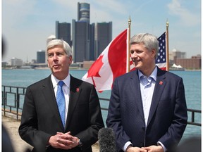 Mich. Gov. Rick Snyder, left, and Prime Minister Stephen Harper announce the Detroit River International Crossing will be named the Gordie Howe International Bridge on May 14, 2015.