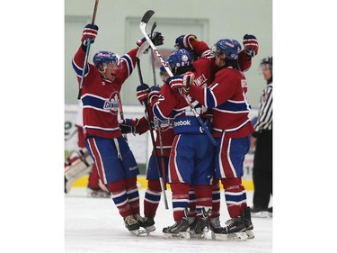 Lakeshore Canadiens Hunter Corp (L), Zack Bedard, Brendan Crundwell and JJ Percy celebrate a goal on Friday, Oct. 2, 2015, at the Atlas Tube Centre in Lakeshore, ON. against Alvinston. (DAN JANISSE/The Windsor Star)