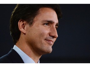 Prime minister-designate Justin Trudeau speaks at the National Press Theatre to during a press conference in Ottawa on Tuesday, October 20, 2015.