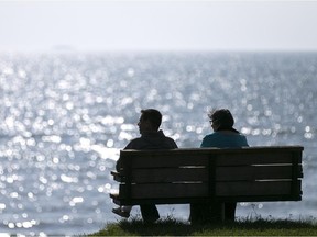 Frank and Susan Staples, of Colchester, enjoy the view of Lake Erie from Colchester Harbour, Monday, Oct. 12, 2015.