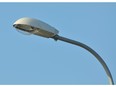 Lamp street lighting on the background of blue sky. Photo by fotolia.com