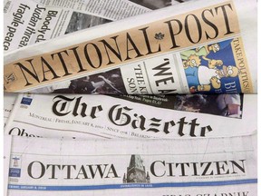 Major Postmedia newspapers are displayed in Ottawa on January 8, 2010.