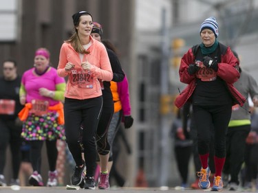 Runners make their way down Riverside Drive in downtown Windsor for the 38th Detroit Free Press/Talmer Bank Marathon, Sunday, Oct. 18, 2015.