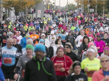 Runners make their way down Riverside Drive in downtown Windsor for the 38th Detroit Free Press/Talmer Bank Marathon, Sunday, Oct. 18, 2015.  (DAX MELMER/The Windsor Star)