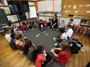 Grade 3 students from Queen Victoria Public School take part in a math lesson in this October 2015 file photo.