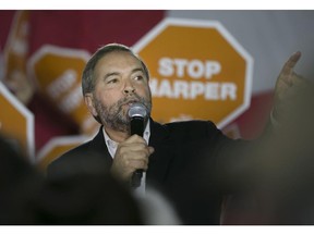 NDP Leader Thomas Mulcair said Sunday, Oct. 4, 2015, in Essex his party would walk away from the trans-Pacific Partnership deal if it meant harming Canada’s agricultural supply management systems and automotive industry.