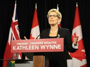 Ontario Premier Kathleen Wynne speaks to the media on Tuesday October 20, 2015.