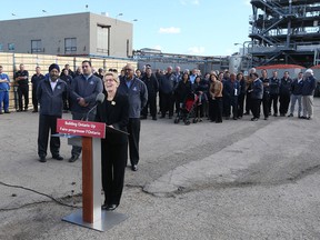 Ontario Premier Kathleen Wynne tours Highbury Canco Corporation in Leamington, Ont. on October 16, 2015.