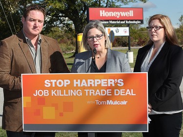 AMHERSTBURG, ONTARIO - OCT 16, 2015 - MPP Taras Natyshak, provincial NDP leader Andrea Horwath (C) and Tracey Ramsey, federal candidate for the riding of Essex are shown during a media conference on Friday, Oct. 16, 2015, in front of the former Honeywell plant in Amhertsburg, Ont.
