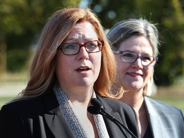 Tracey Ramsey (L), federal candidate for the riding of Essex and provincial NDP leader Andrea Horwath  are shown during a media conference on Friday, Oct. 16, 2015, in front of the former Honeywell plant in Amhertsburg, Ont.