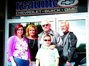 Longtime Reaume Chev customer Don Bechard (centre) and family. Left to right: Granddaughter Sara, daughter Kim Chadwick, Don, son in lay Paul Chadwick and grandson Ethan.