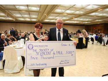 Santina Ferrera, president of the Italian Women's Club G. Caboto Auxiliary, with Ib Fynbo, president of the Society of St. Vincent de Paul at a gala Sunday evening. (CAROLYN THOMPSON/The Windsor Star)