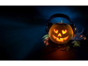 Scary pumpkin DJ on a dark background. Image by fotolia.com.