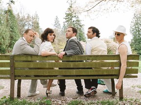 The members of Canadian indie rock band Stars in a promotional image.