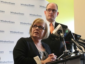 WINDSOR, ONTARIO - OCTOBER 30, 2015 -  Lori Atkinson, senior director, head of Canadian operations, Sutherland Global Services, and Windsor Mayor Drew Dilkens speak during a press conference announcing 300 part-time jobs at Sutherland Global Services.