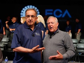 Fiat Chrysler Automobiles CEO Sergio Marchionne, left, and United Auto Workers President Dennis Williams