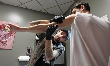 Tattoo artist Dave Kant of Advance Tattoo in Windsor, Ont.