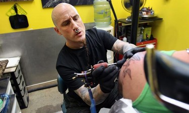 Tattoo artist Tim Reid of Black Sheep Piercing & Tattoo Studios in Windsor, Ont.