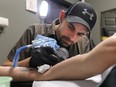 Tattoo artist Dave Kant of Advance Tattoo and Piercing in Windsor, Ont.