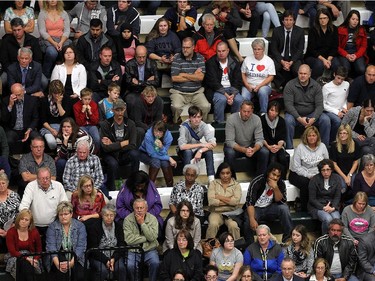 The crowd applauds during a special Greater Essex County District School Board meeting at the St. Clair College SportsPlex in Windsor on Tuesday, October 13, 2015. The closure of Harrow District High School and Western Secondary School was the topic of the special meeting.