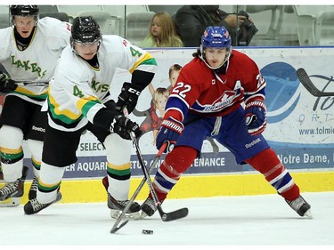 The Lakeshore Canadiens Brendan Crundwell and the Wallaceburg Lakers Kadin Ritchie chase a loose puck at the Atlas Tube Centre in Lakeshore on Friday, October 16, 2015.                                      (TYLER BROWNBRIDGE/The Windsor Star)