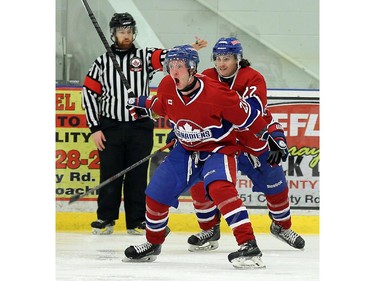 The Lakeshore Canadiens Jack Bartlett and Brendan Crundwell (back) celebrate a goal against the Wallaceburg Lakers at the Atlas Tube Centre in Lakeshore on Friday, October 16, 2015.                                      (TYLER BROWNBRIDGE/The Windsor Star)