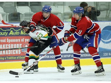 The Lakeshore Canadiens Kyle Gagnon and JJ Percy (right) tie up Tyler Shaw of the Wallaceburg Lakers at the Atlas Tube Centre in Lakeshore on Friday, October 16, 2015.                                      (TYLER BROWNBRIDGE/The Windsor Star)