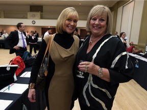 WINDSOR, ON. OCTOBER 29, 2015. --  Martha Pieterson-Bondy and Gloria Moon (left to right) attend the Do Good Divas Gala at the Caboto Club in Windsor on Thursday, October 29, 2015. The annual event auction off 416 purses.                                      (TYLER BROWNBRIDGE/The Windsor Star)