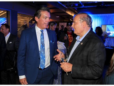 Windsor Star Editor-in-chief Marty Beneteau, left, chats with City of Windsor councillor Ed Sleiman during launch gala for New Windsor Star at News Cafe October 15, 2015.