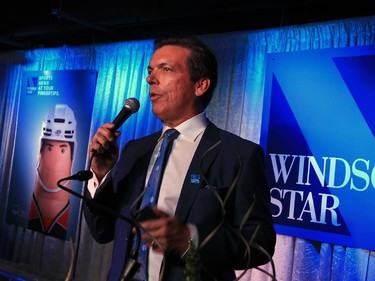Windsor Star Editor-in-chief Marty Beneteau welcomes an enthusiastic crowd during New Windsor Star launch gala held at News Cafe October 15, 2015.