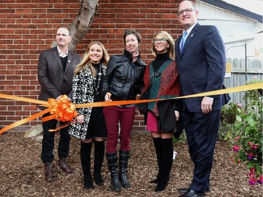 John Miller from Matassa Inc. ,  Samantha Zekelman, Tamara Kowalska,  Stephanie Zekelman, and Windsor Mayor Drew Dilkens during a ribbon cutting ceremony to open the new Windsor Youth Centre on Wyandotte Street east in Windsor, Ontario on October 17, 2015.  The (JASON KRYK/The Windsor Star)