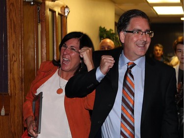 Brian Masse and Cheryl Hardcastle celebrate their victories at the Teutonia Club in Windsor, Ont.