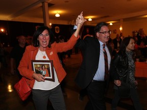 Brian Masse and Cheryl Hardcastle celebrate their victories at the Teutonia Club in Windsor, Ontario.