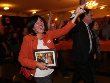 Brian Masse and Cheryl Hardcastle celebrate their victories at the Teutonia Club in Windsor, Ontario.   (JASON KRYK/Windsor Star)