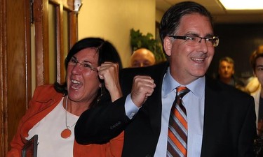 Brian Masse and Cheryl Hardcastle celebrate their victories at the Teutonia Club in Windsor, Ontario.