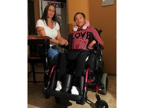 Teresa Commisso, left, is outraged over a letter from Holy Names High School which states her daughter's lunch will not be heated up because of "work to rule" order by the union, Oct. 2, 2015. Commisso's daughter Tayla Rock, left, has severe cerebral palsy. (NICK BRANCACCIO/The Windsor Star)