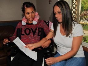 Teresa Commisso, right, is outraged over a letter from Holy Names high school which states her daughter's lunch will not be heated up because of a work-to-rule action educational assistants.  Commisso's daughter Tayla Rock, left, has severe cerebral palsy.