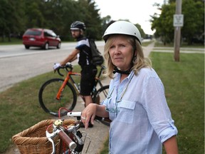 Lori Newton, and Oliver Swainson from  Bike Friendly Windsor Essex ride their bikes near Cabana Road west and Granada Avenue in Windsor, Ontario on September 28, 2015. (JASON KRYK/The Windsor Star)
